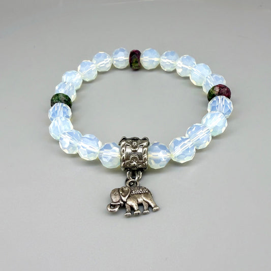 Opal and rhodochrosite beaded bracelet, 17cm, light crystal-blue and soft pink gemstone beads on elastic stretch band.