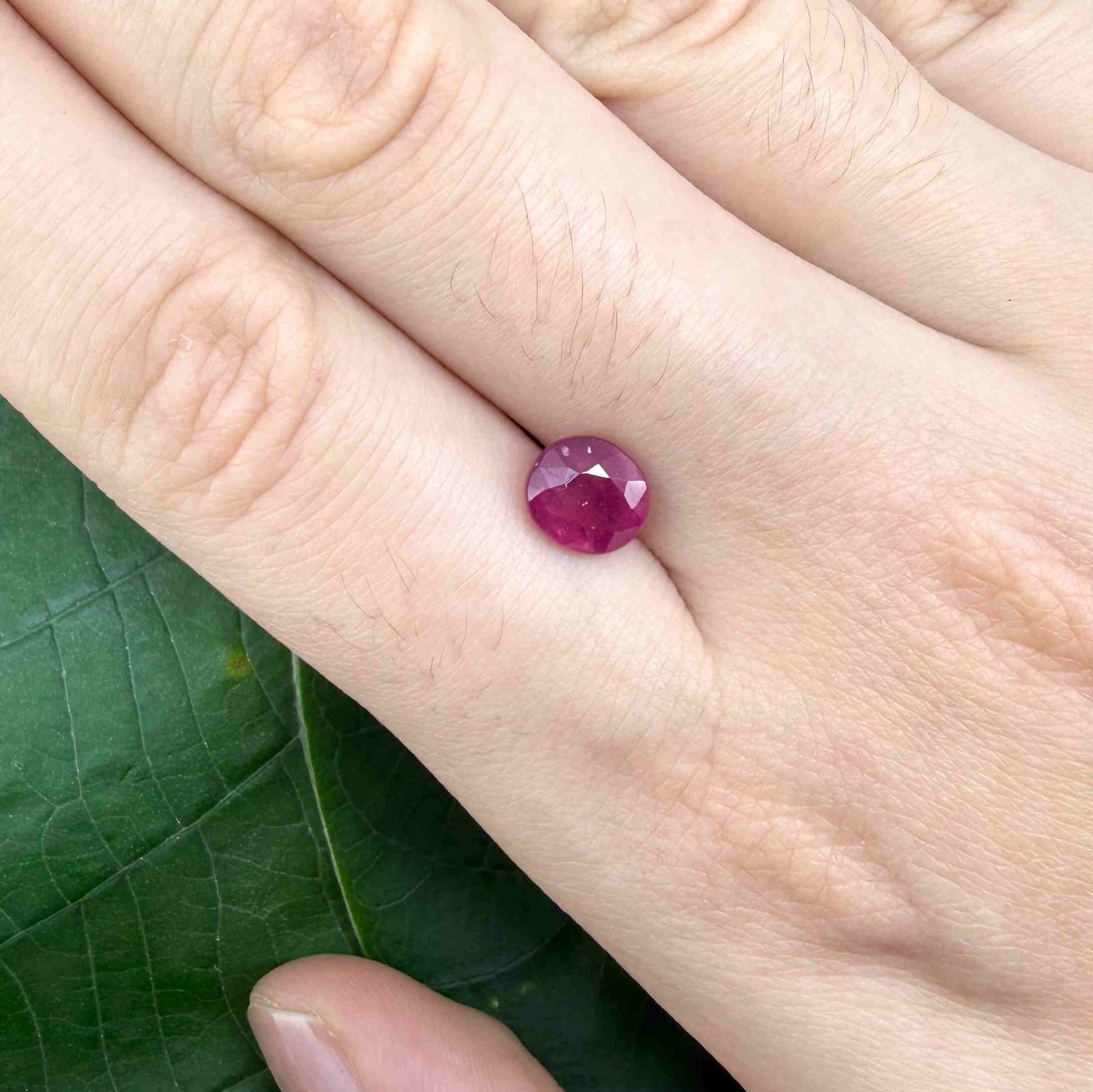 2.1 ct natural pink-red Songea ruby, oval cut.