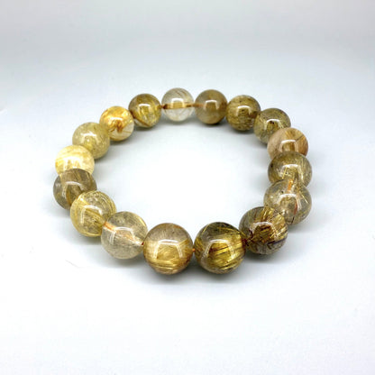 Rutilated quartz beaded bracelet, 18cm, natural gemstone beads with golden rutile threads on elastic stretch band