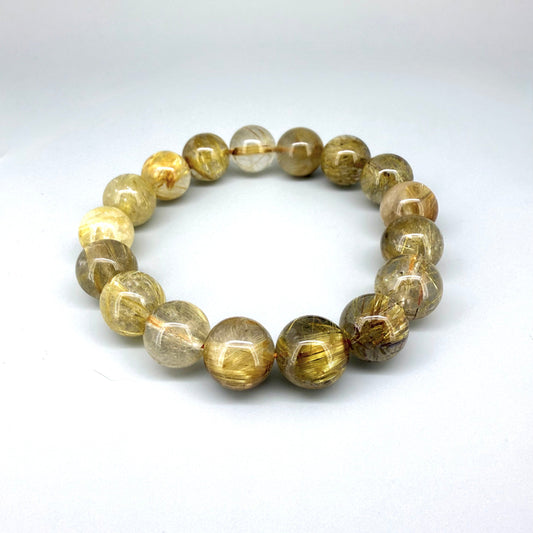Rutilated quartz beaded bracelet, 18cm, natural gemstone beads with golden rutile threads on elastic stretch band