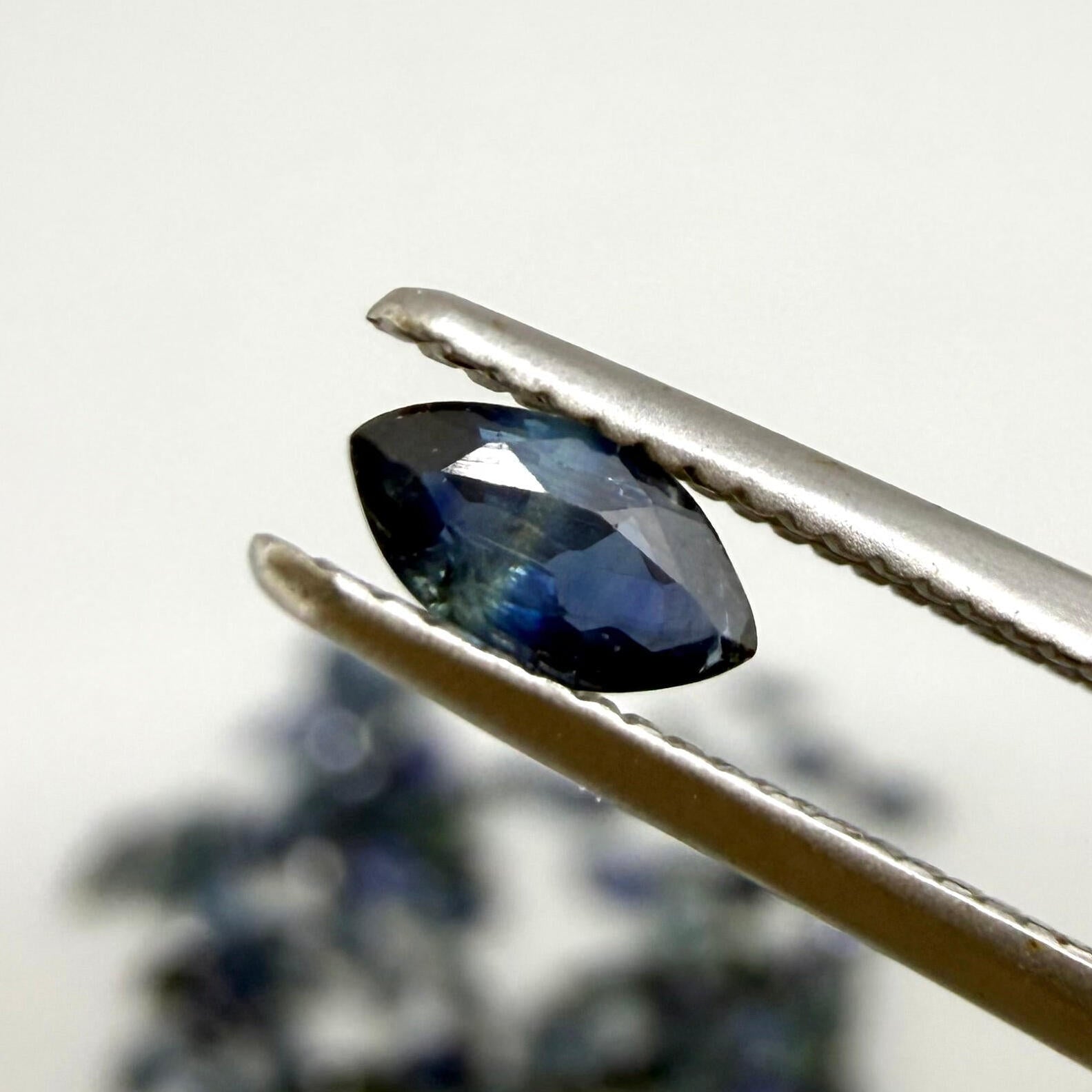 13.2 ct natural sapphire lot from Thailand, marquise cut stones in mid-to-dark vibrant blue hues.