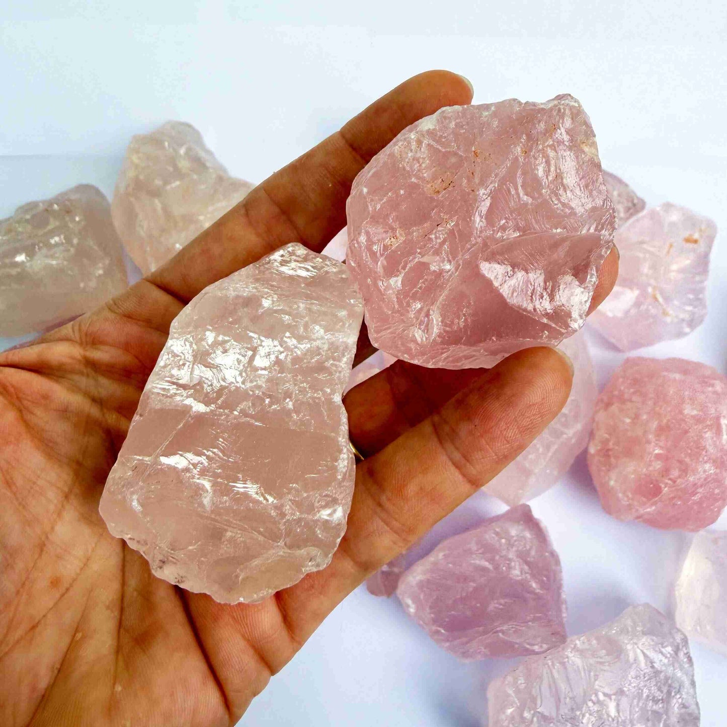 Natural rose quartz rough stones, untreated pink quartz in raw form for lapidary and jewelry projects