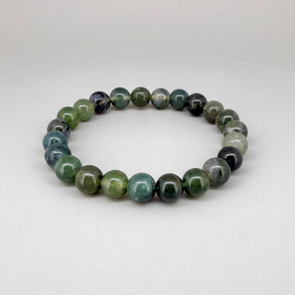 Moss agate beaded bracelet, 18cm, natural green and white gemstone beads with moss-like patterns on elastic stretch band.