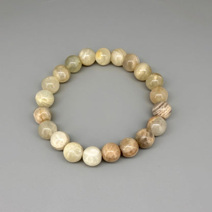 Moonstone beaded bracelet, 19cm, beige and earthy gemstone beads with subtle shimmer on elastic stretch band.