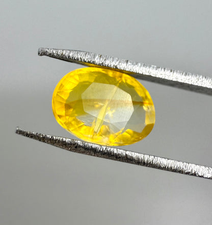 Bi-Color (White, Yellow-Orange) Fire Opal Oval 0.8 Ct