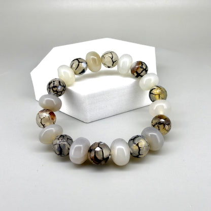 Dragon vein agate and agate beaded bracelet, 17cm, grey and white gemstone beads with vein-like patterns and metal accents on elastic stretch band.