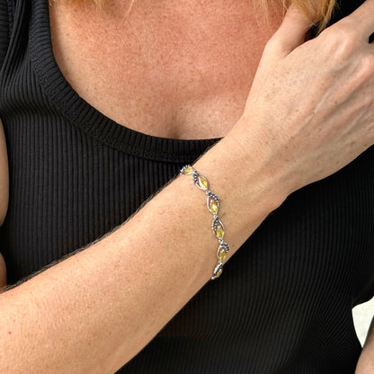 Sapphire bracelet with yellow and blue gemstones set in white gold plated silver