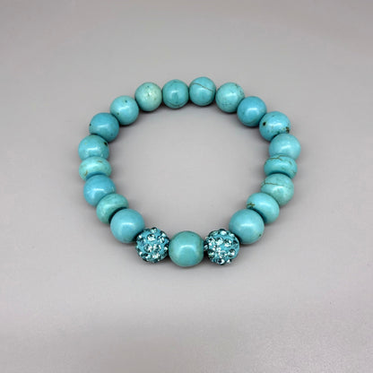 Howlite beaded bracelet, 18cm, white gemstone beads with grey veining and two sparkling accent beads on elastic stretch band.