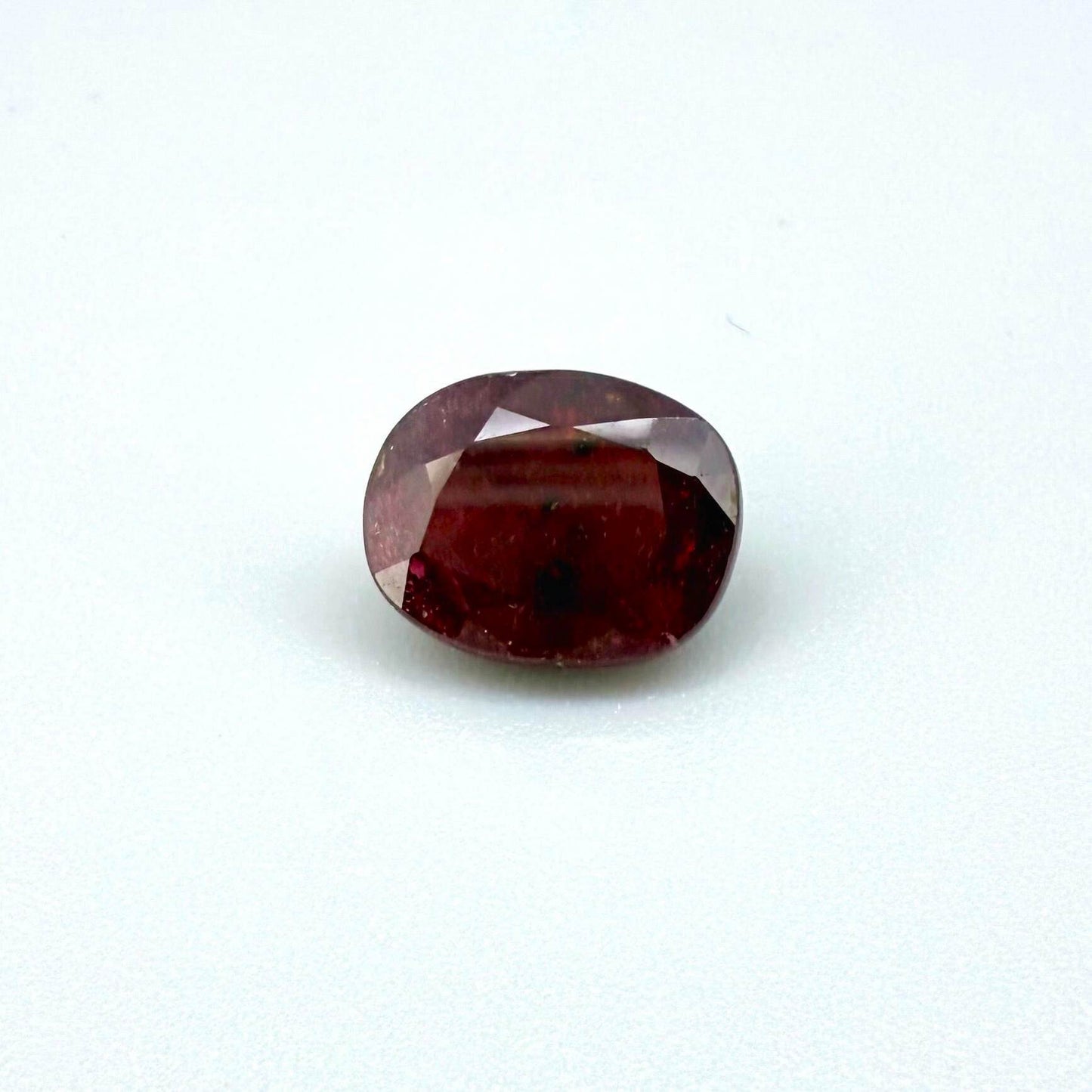 4.5 ct natural ruby from Madagascar, oval cut with vibrant red color.