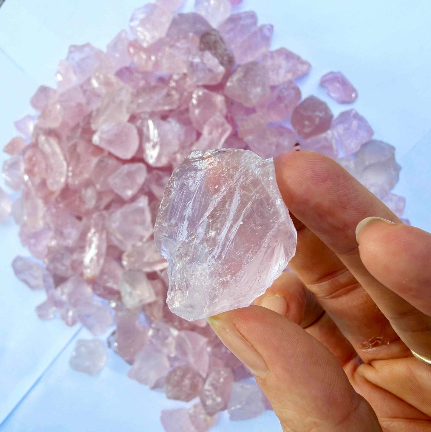 Natural rose quartz rough stones, untreated pink quartz in raw form for lapidary and jewelry projects