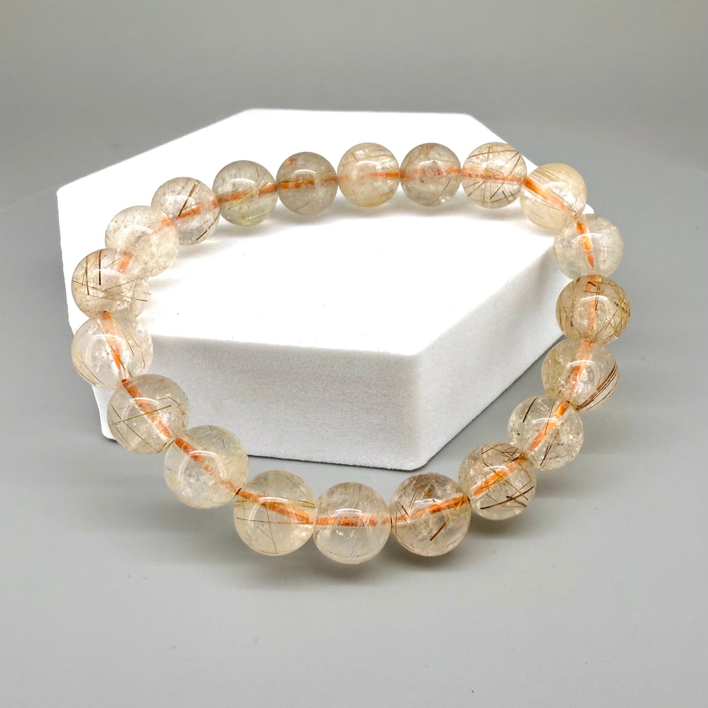 Bronze rutilated quartz beaded bracelet, natural gemstone beads with bronze rutile threads on elastic stretch band.
