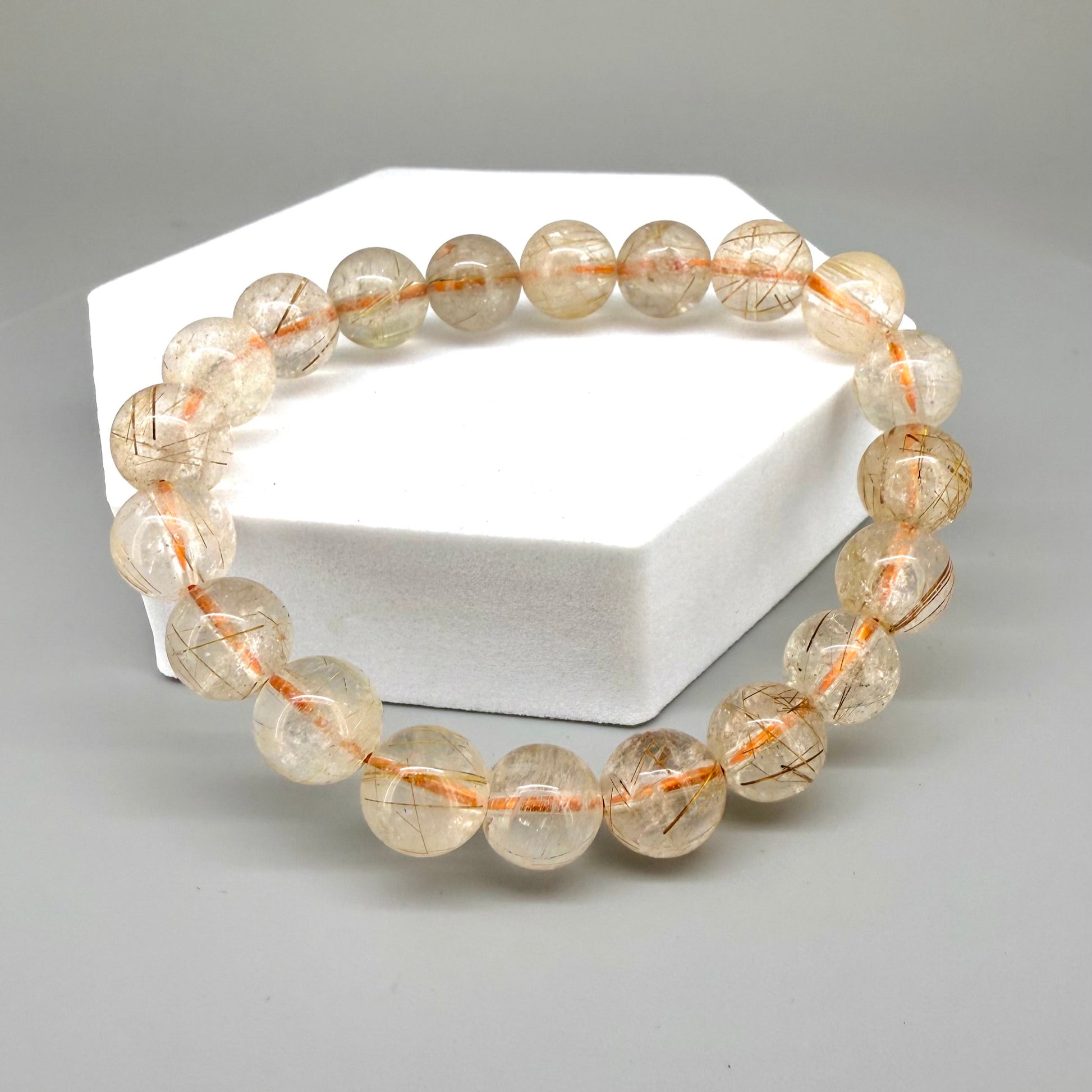 Bronze rutilated quartz beaded bracelet, natural gemstone beads with bronze rutile threads on elastic stretch band.