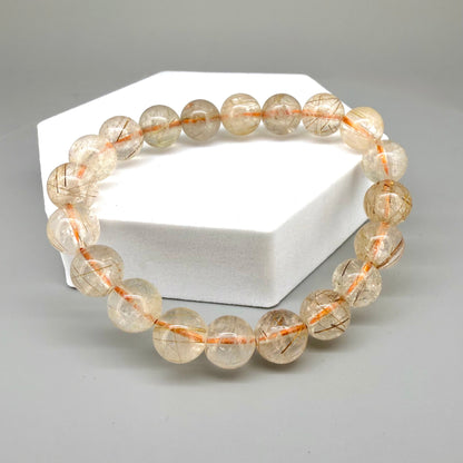 Bronze rutilated quartz beaded bracelet, natural gemstone beads with bronze rutile threads on elastic stretch band.