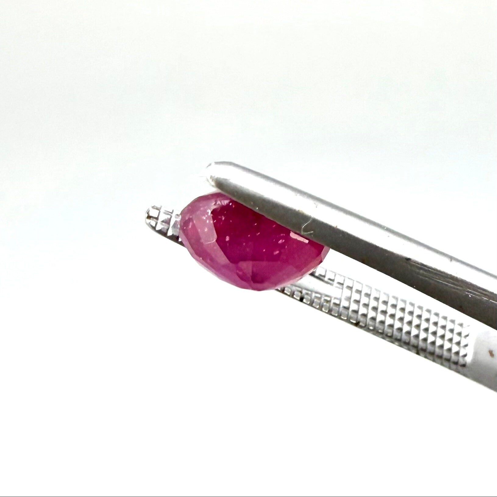 2.1 ct natural pink-red Songea ruby, oval cut.