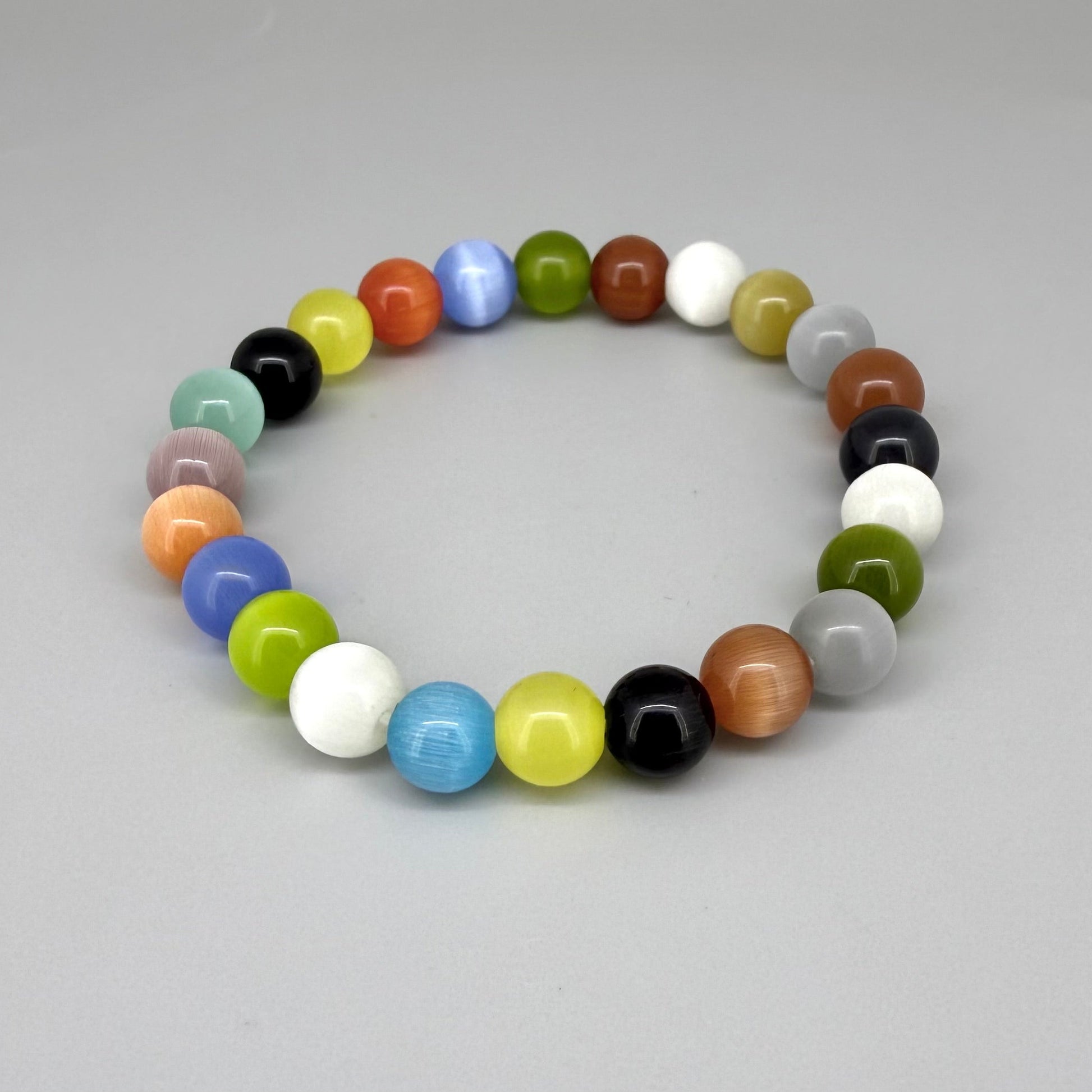 Multicolor cat’s eye beaded bracelet, 17cm, bright shimmering gemstone beads on elastic stretch band.