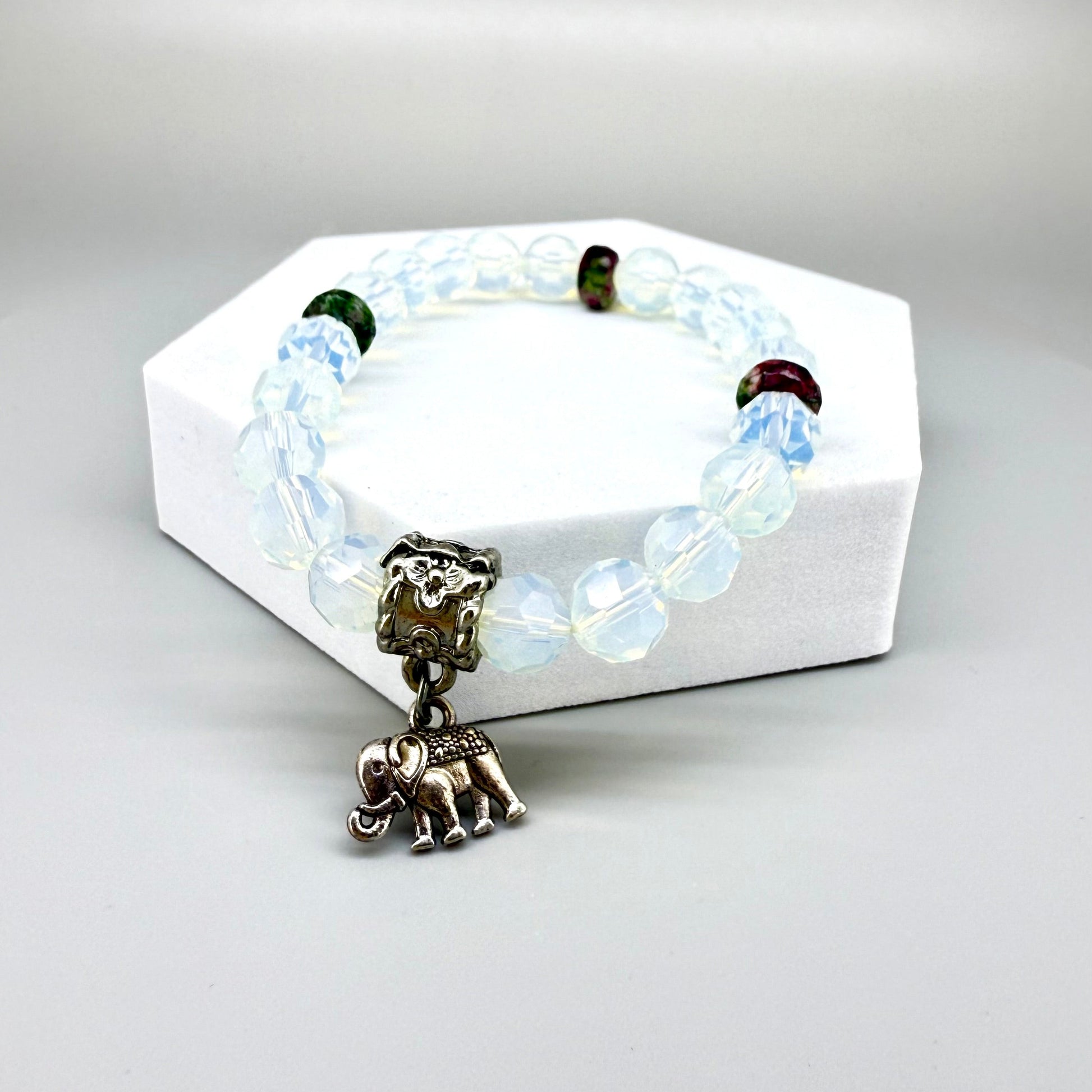 Opal and rhodochrosite beaded bracelet, 17cm, light crystal-blue and soft pink gemstone beads on elastic stretch band.