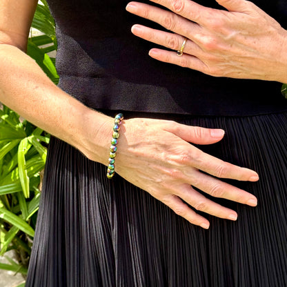 Rainbow hematite beaded bracelet, 18cm, iridescent multicolor gemstone beads on elastic stretch band.