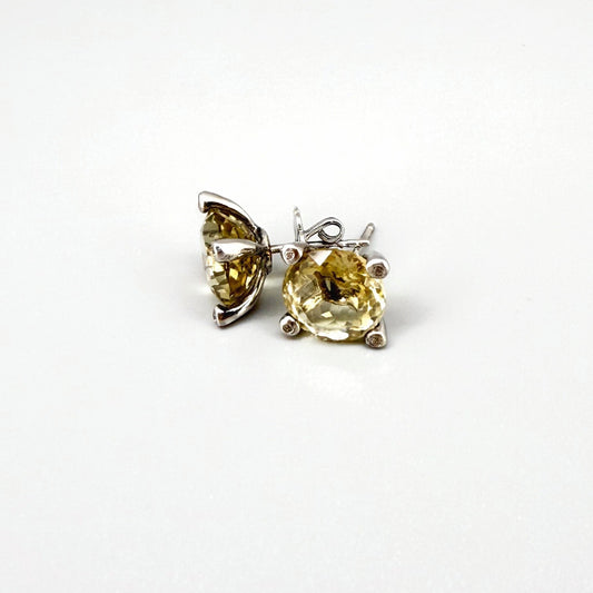 White gold plated silver stud earrings with 8.3 ct natural Lemon Quartz; golden-yellow gemstones in refined design.