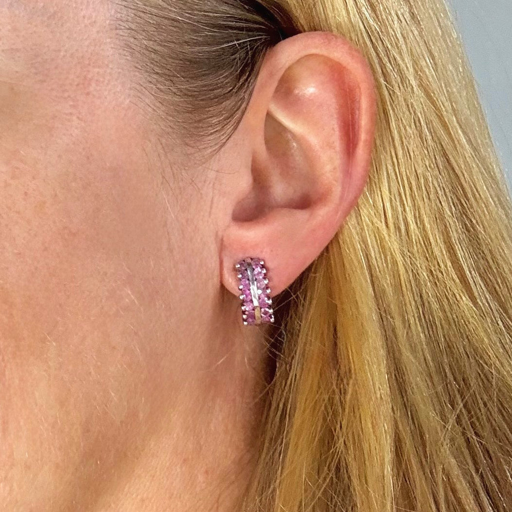 White gold plated silver hoop earrings with natural amethysts in vivid lilac tones; elegant and timeless gemstone design.