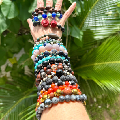 Multi natural beaded gemstone bracelets worn on arm 