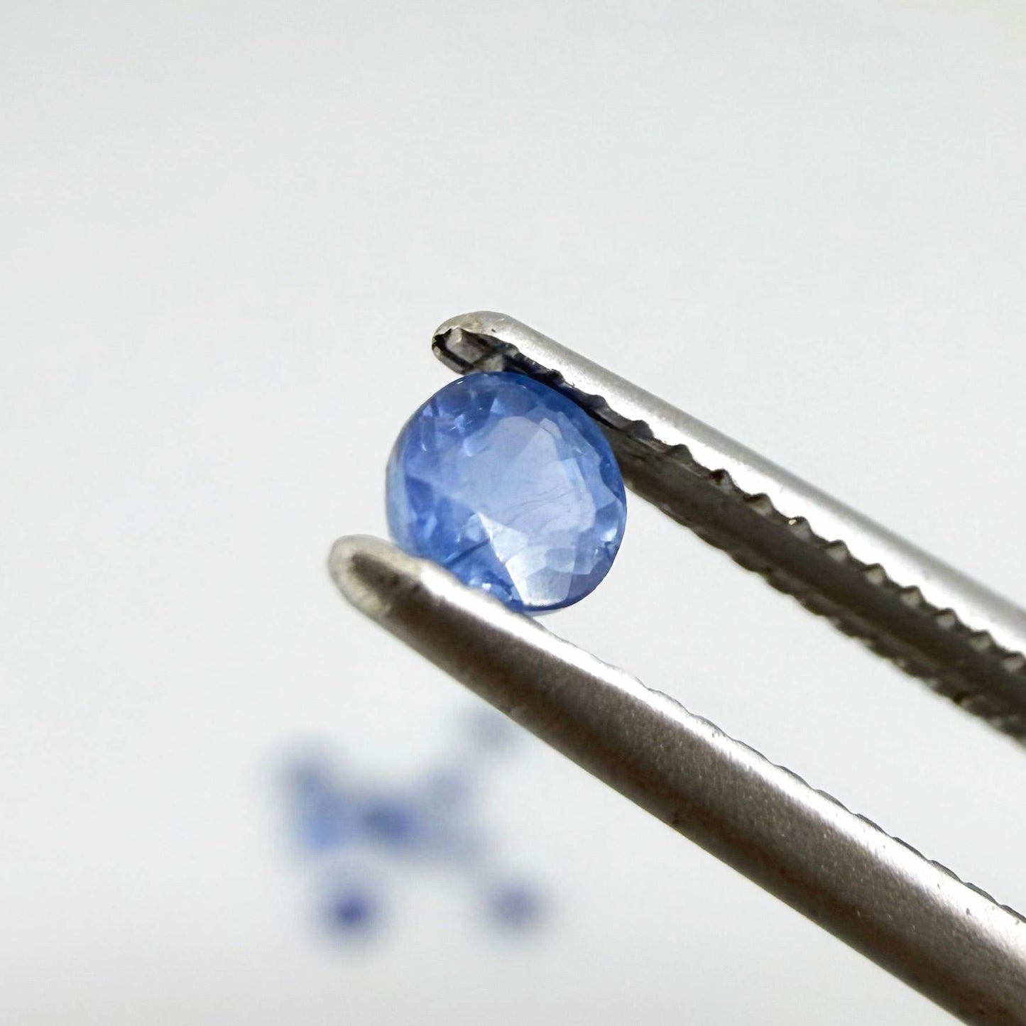 1.58 ct natural sapphire lot from Bangkaja, round cut stones with blue hues.