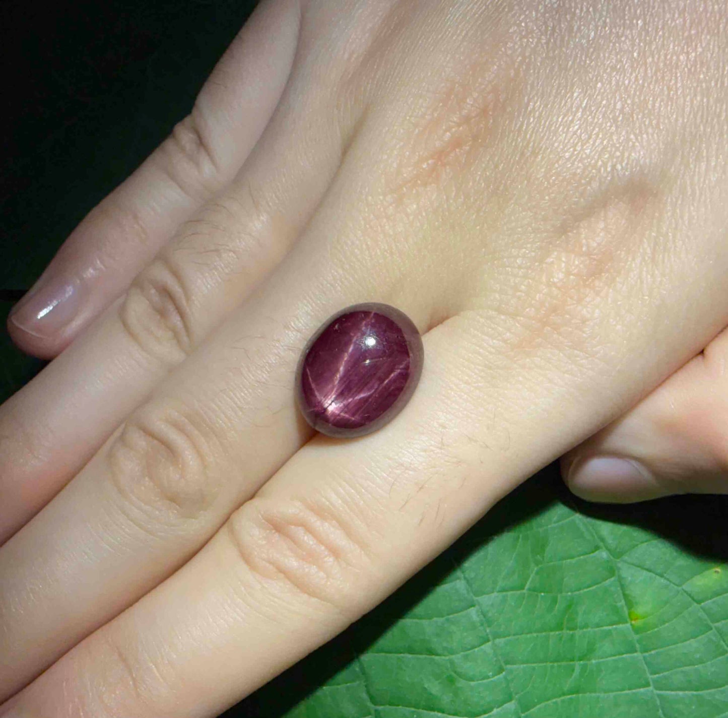 16.7 ct natural Bordeaux-Red Star Ruby cabochon from Mozambique with soft star effect and polished dome.