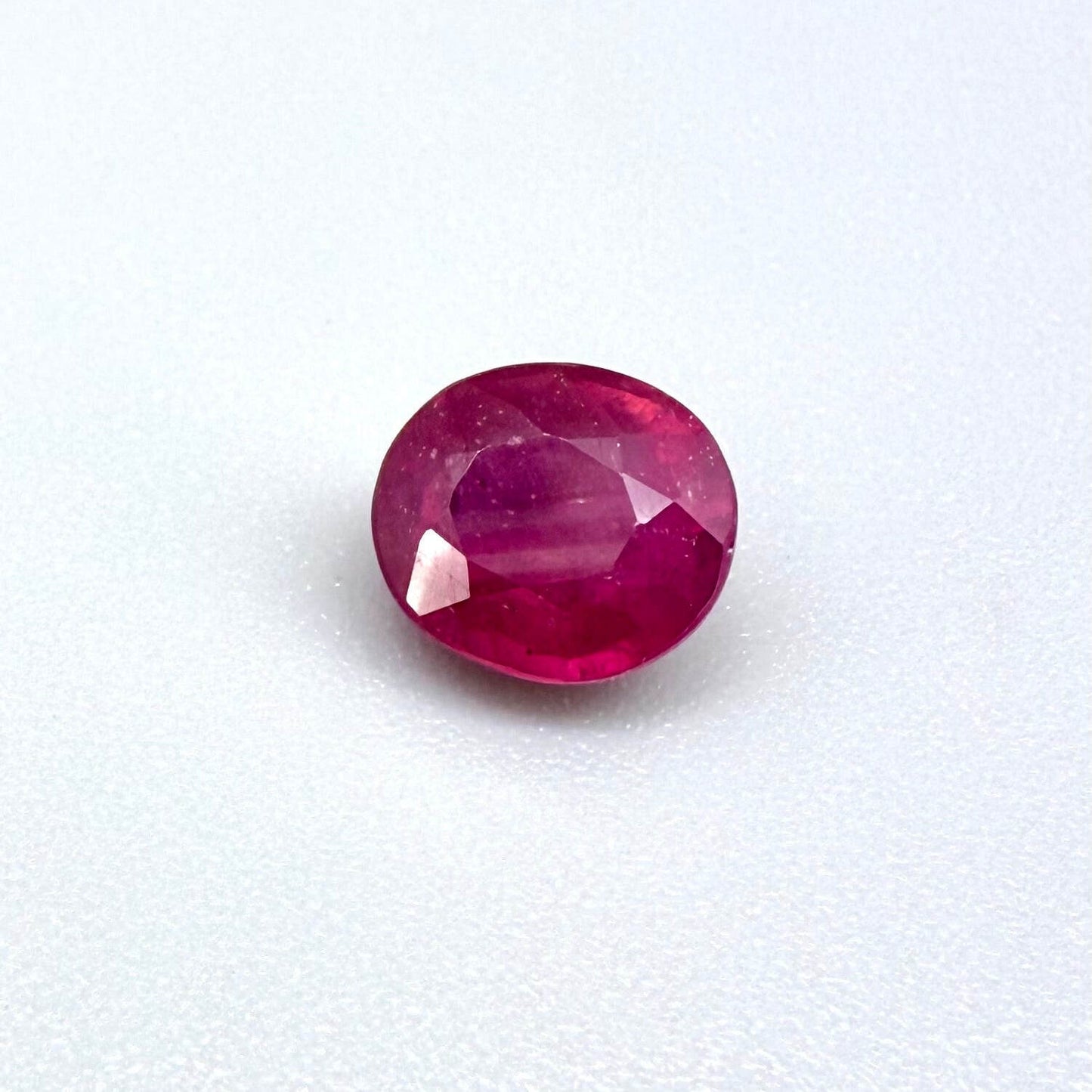 2.1 ct natural pink-red Songea ruby, oval cut.