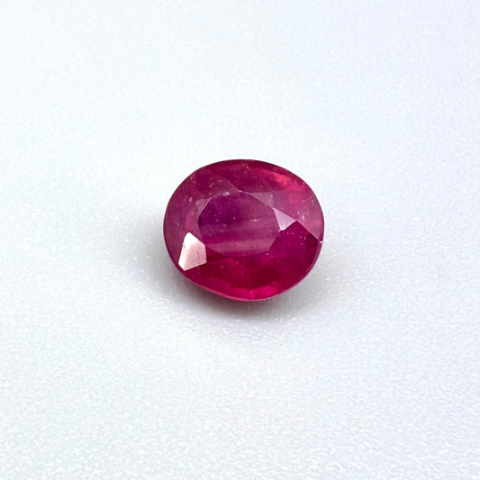 2.1 ct natural pink-red Songea ruby, oval cut.