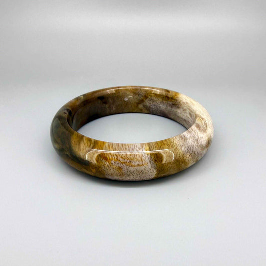 Natural jade bangle bracelet in beige and brown tones, smooth polished finish, 18 cm inner circumference