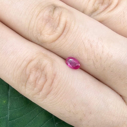 0.32 ct natural pink-red Songea ruby, oval cut.