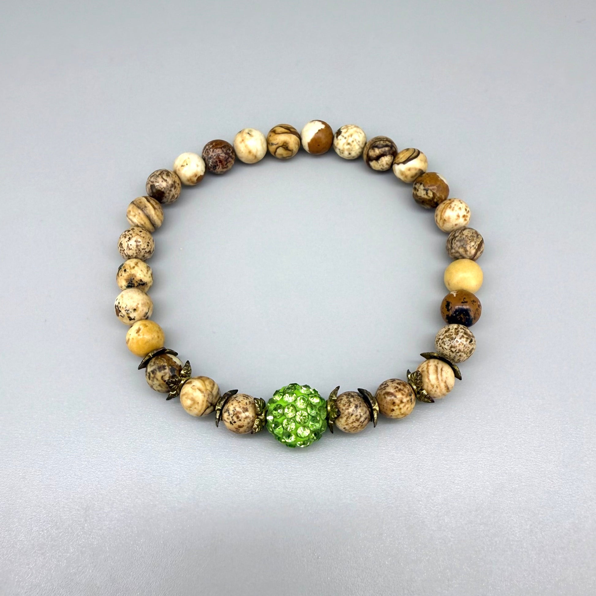 Jasper beaded bracelet, natural gemstone beads in light earthy tones on elastic stretch band.