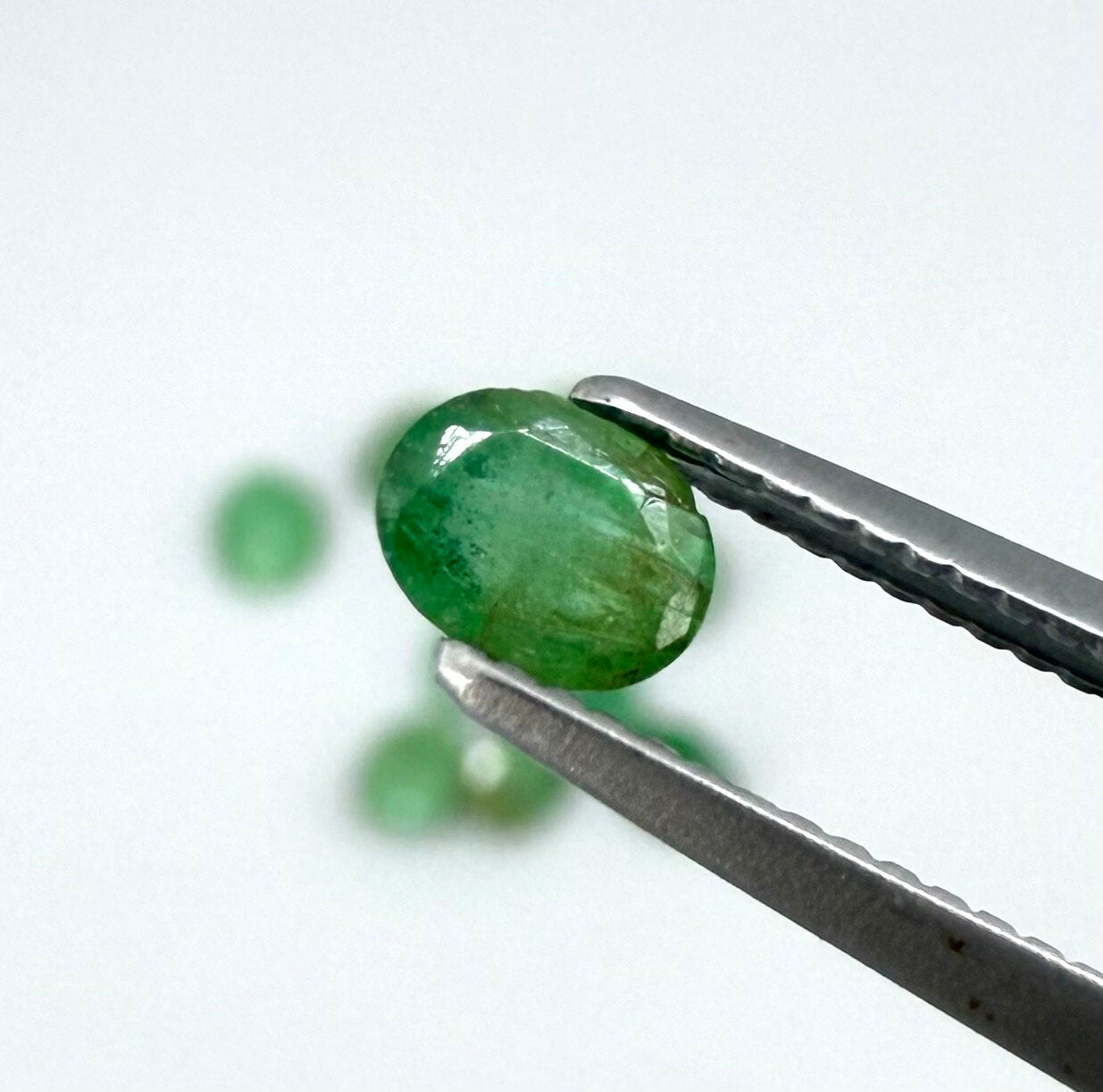 2.3 ct natural emerald lot from Zambia, oval stones 
