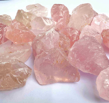 Natural rose quartz rough stones, untreated pink quartz in raw form for lapidary and jewelry projects