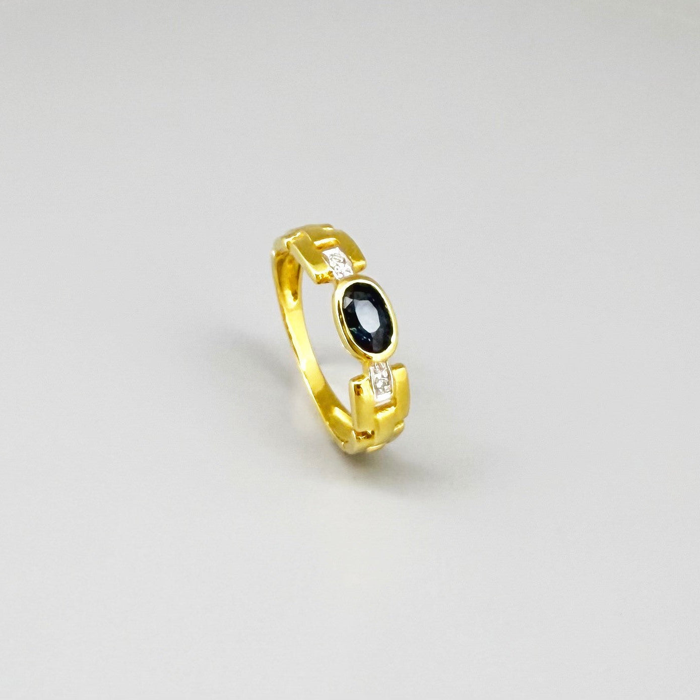 23k gold ring with 0.49 ct Laos sapphire and diamonds, deep blue gemstone in elegant classic setting, size 52.