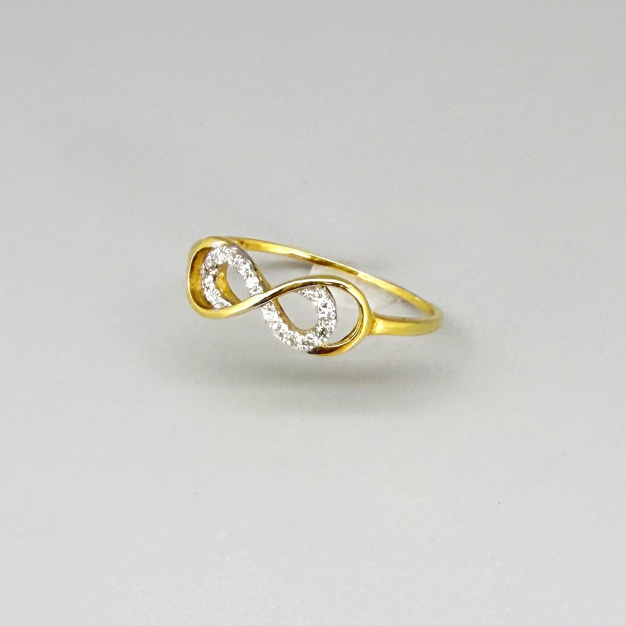 14k gold ring with 0.095ct natural diamonds in an elegant, minimalist design.