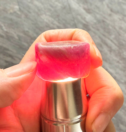 Natural Ruby rough (Corundum) in pink-lilac tones, treated gemstone specimen.