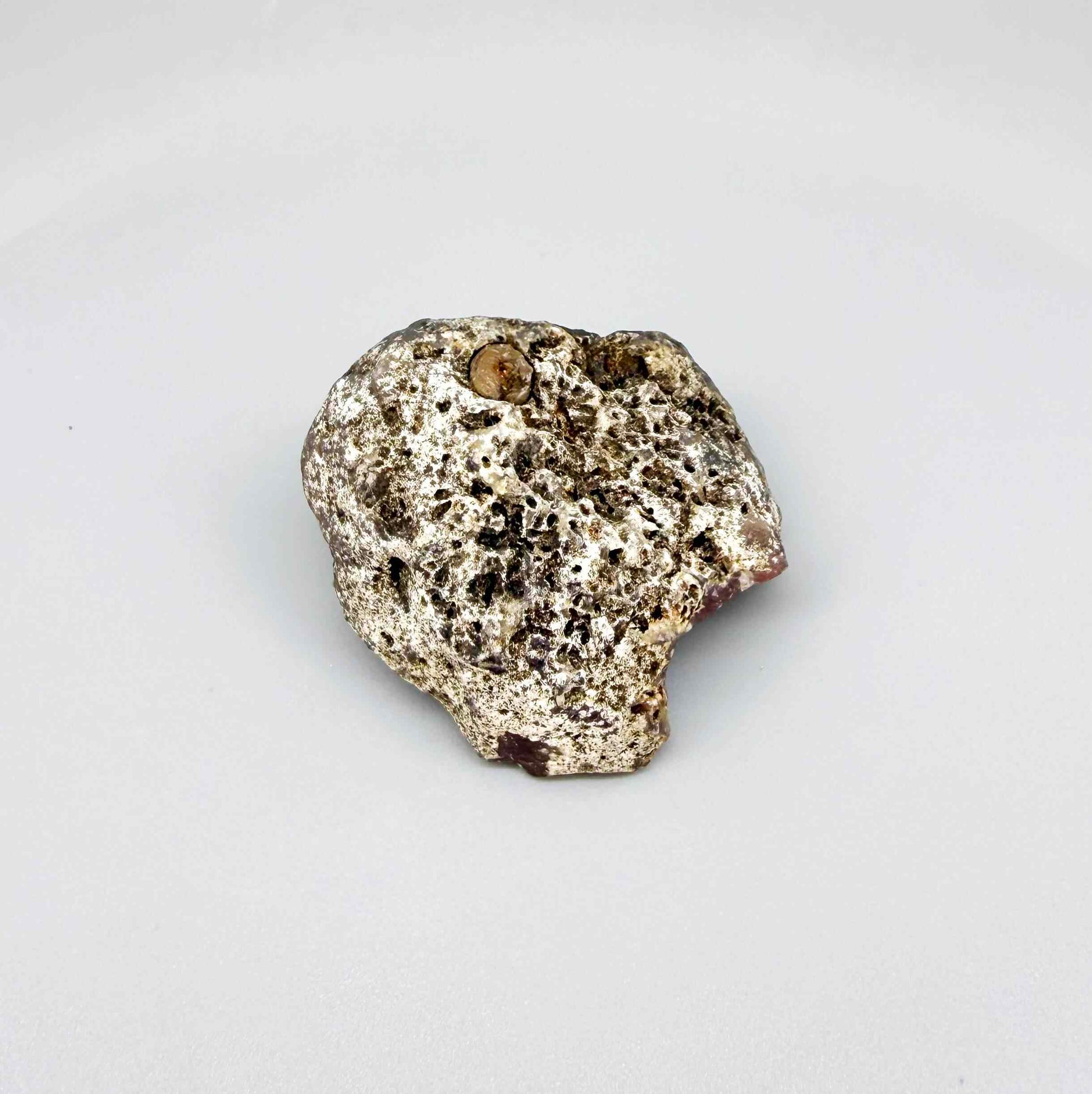 Chalcedony rough stone with orange-red carnelian core and darker translucent zones, natural quartz specimen.