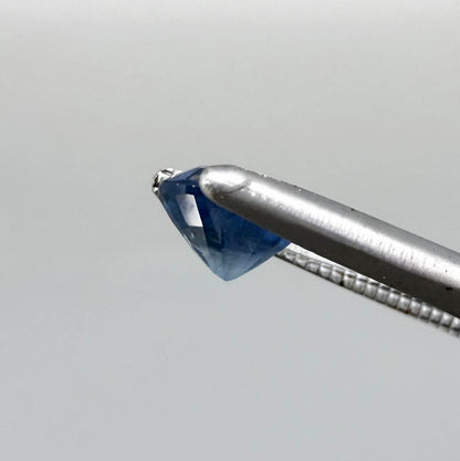 Soft medium blue sapphire in oval cut with natural silky texture and gentle blue color tone.