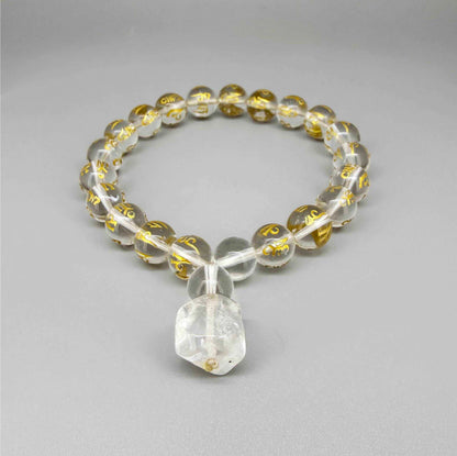Clear quartz mala bracelet with 21 engraved beads and Om Mani Padme Hum mantra. A meaningful piece for clarity, intention and inner peace.
