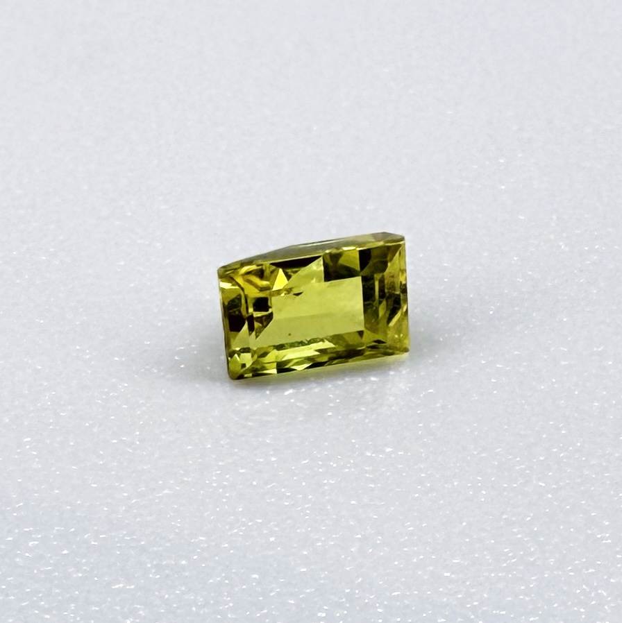 Baguette lemon yellow sapphire from Bangkaja, Thailand with bright vivid color and sharp faceting.