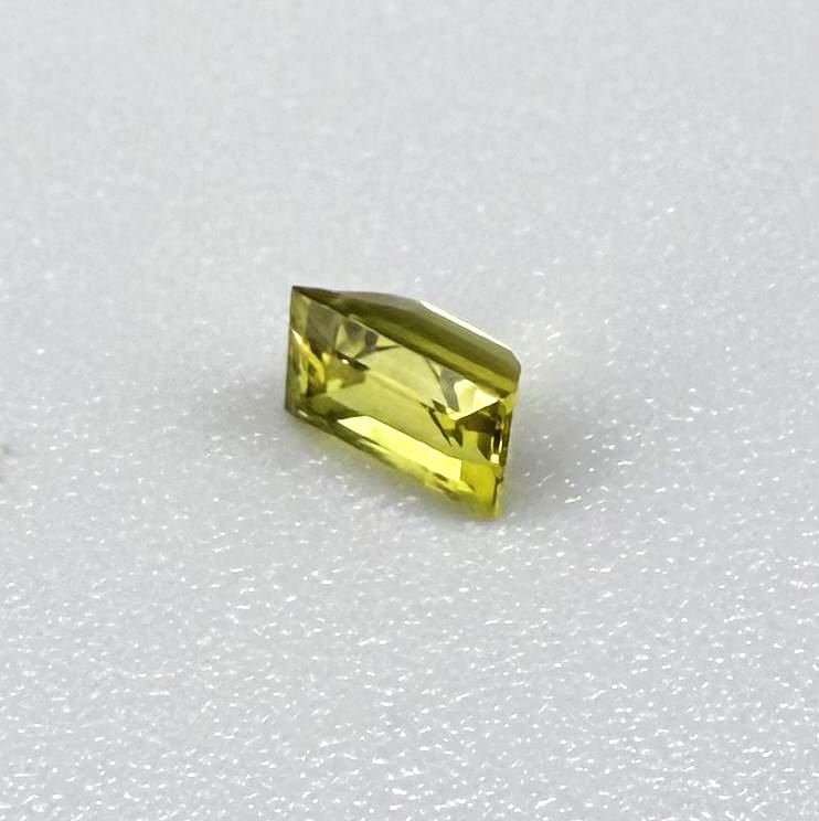 Baguette lemon yellow sapphire from Bangkaja, Thailand with bright vivid color and sharp faceting.