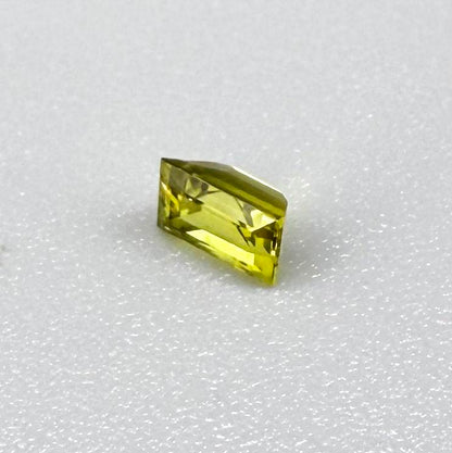 Baguette lemon yellow sapphire from Bangkaja, Thailand with bright vivid color and sharp faceting.