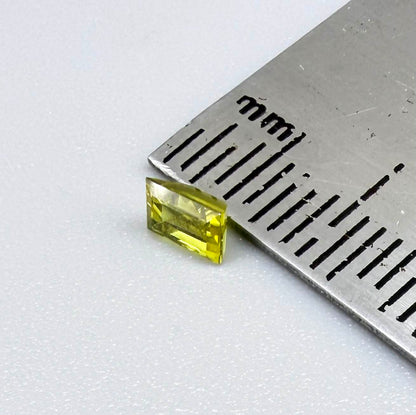Baguette lemon yellow sapphire from Bangkaja, Thailand with bright vivid color and sharp faceting.