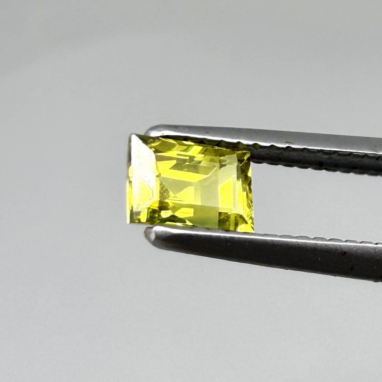 Baguette lemon yellow sapphire from Bangkaja, Thailand with bright vivid color and sharp faceting.