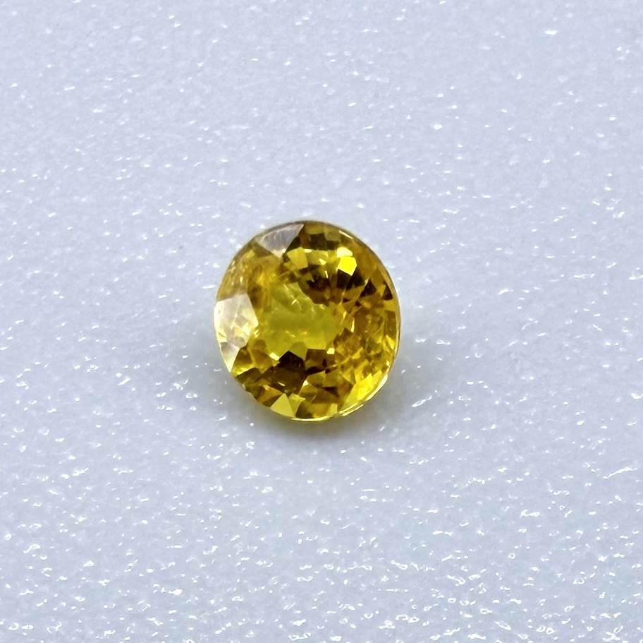 Golden-Yellow Sapphire Round - 0.1 Ct