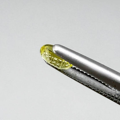 Oval light lemon yellow sapphire from Bangkaja, Thailand with fresh bright color and natural brilliance.