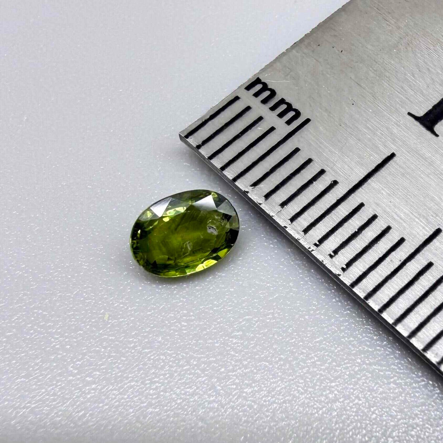Deep Olive-Green Sapphire Oval - 0.5 ct