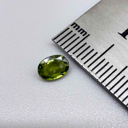 Deep Olive-Green Sapphire Oval - 0.5 ct