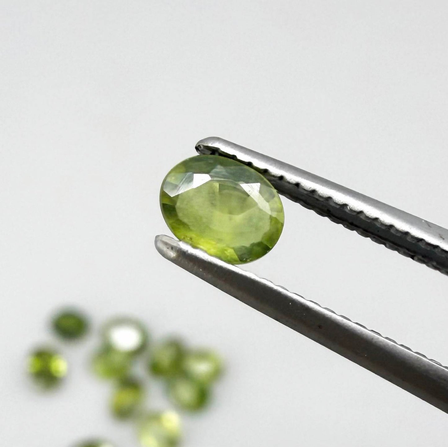 Lot of oval green sapphires from Thailand, 3.02ct total weight, unheated, with fresh to olive-green tones, mostly eye-clean to lightly included and transparent appearance.