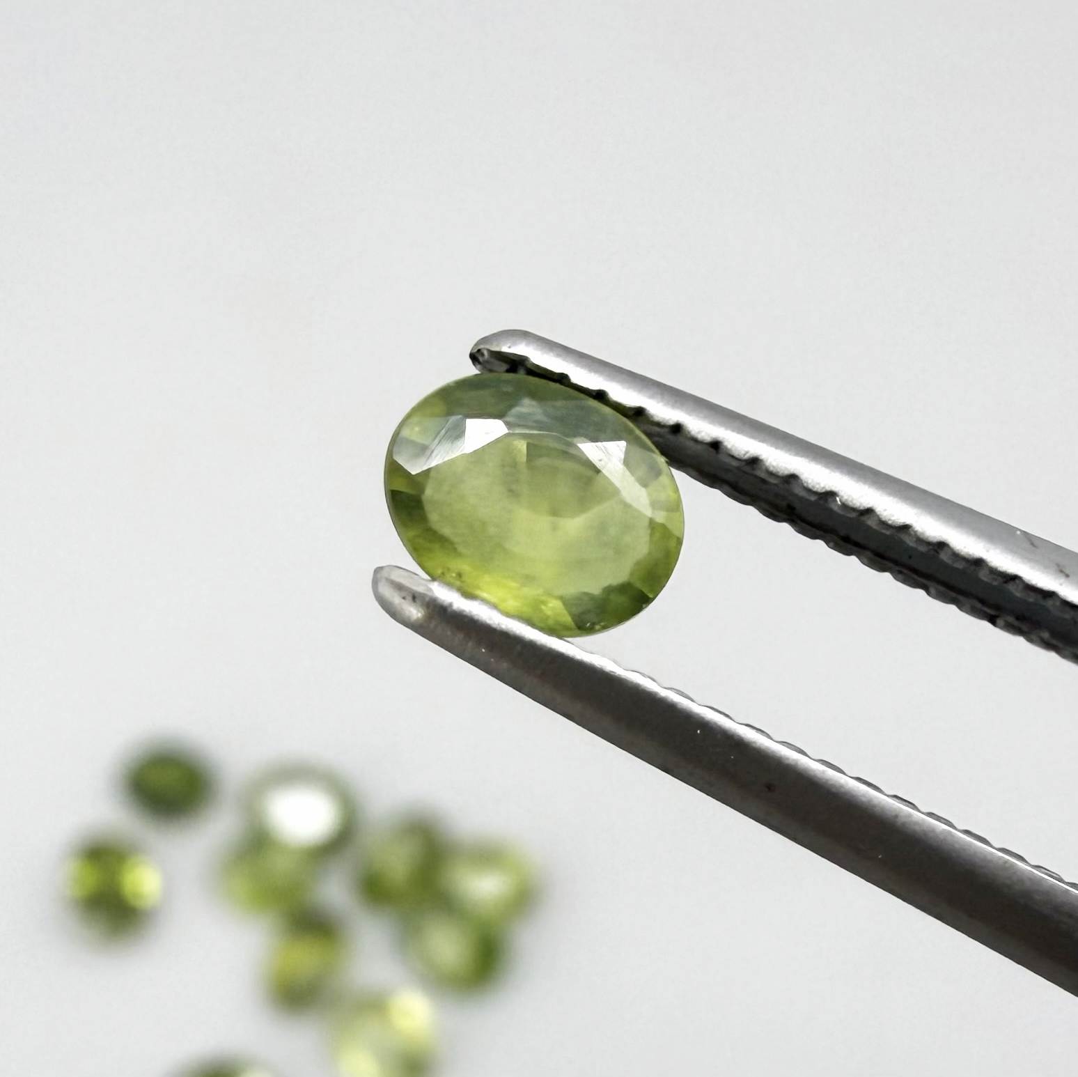 Lot of oval green sapphires from Thailand, 3.02ct total weight, unheated, with fresh to olive-green tones, mostly eye-clean to lightly included and transparent appearance.